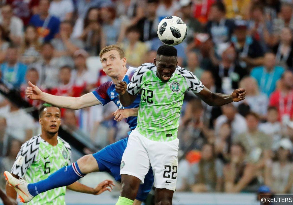 Kenneth Omeruo wins a header for Nigeria against Iceland