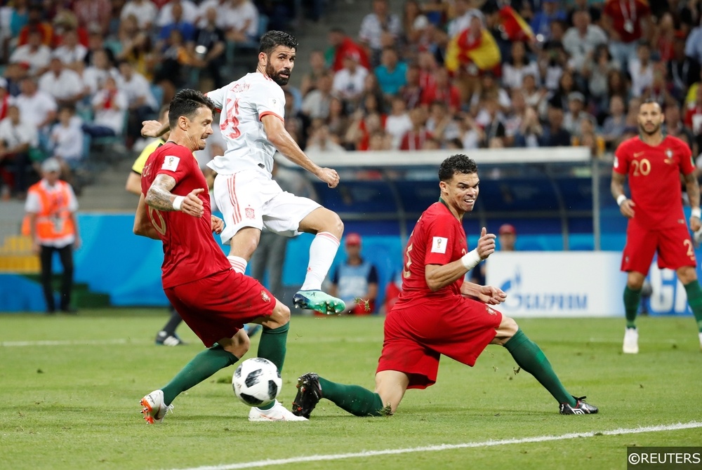 Pepe defending for Portugal against Spain at the World Cup