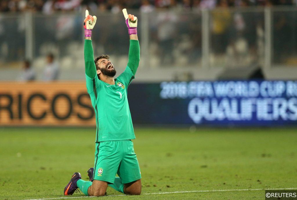 Alisson celebrates a win for Brazil