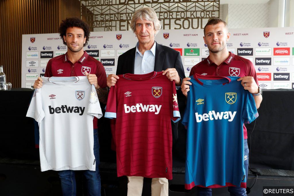West Ham manger Manuel Pellegrini with Felipe Anderson and Jack Wilshere