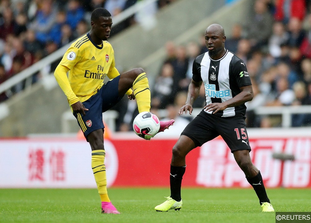 Arsenal's Nicolas Pepe controls the ball away to Newcastle