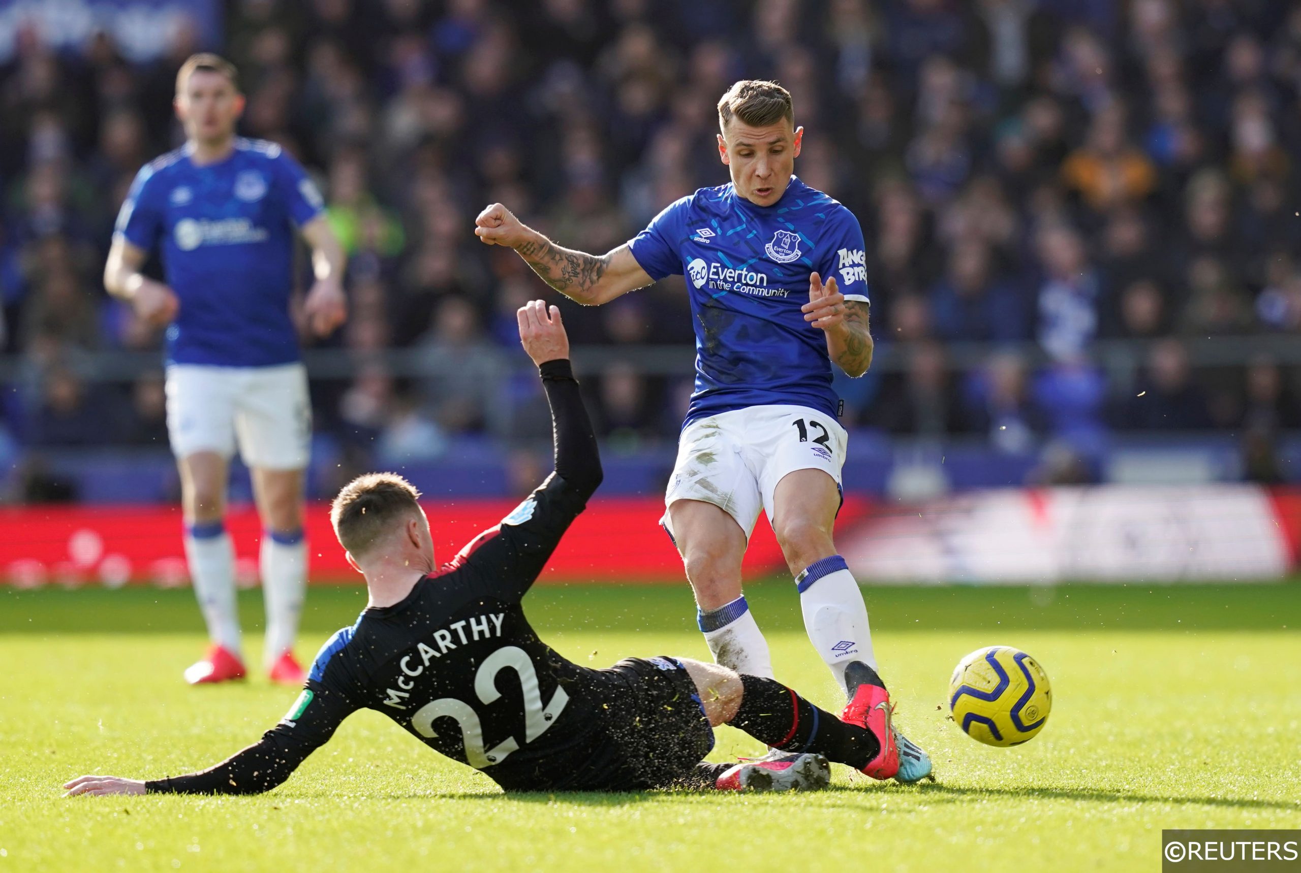 Everton defender Lucas Digne tackled