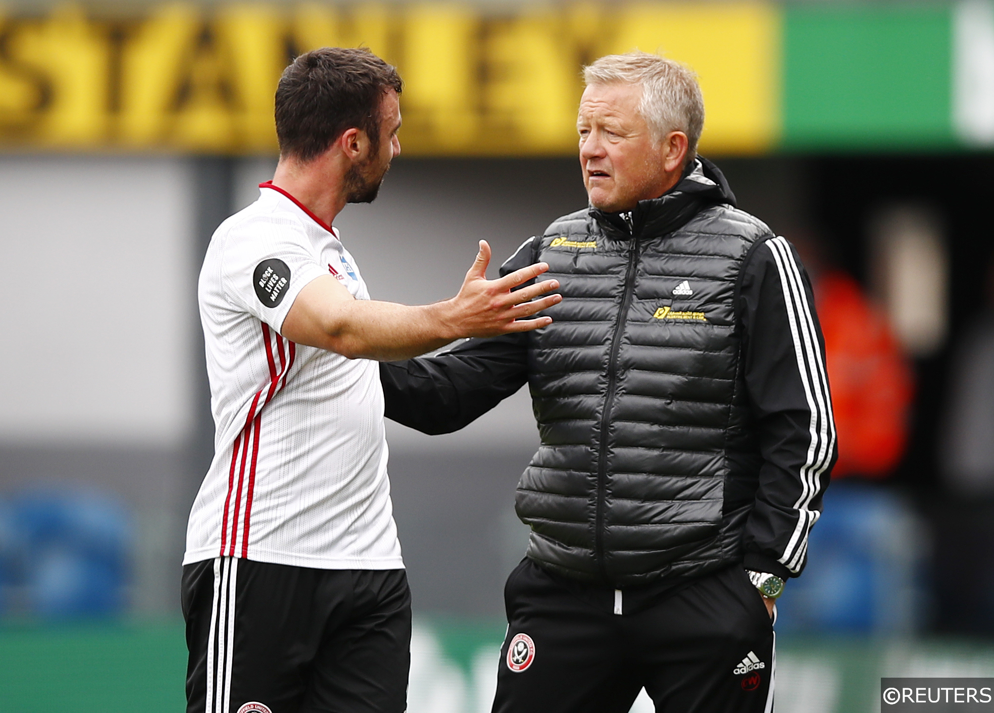 Blades manager Chris Wilder with defender Enda Stevens