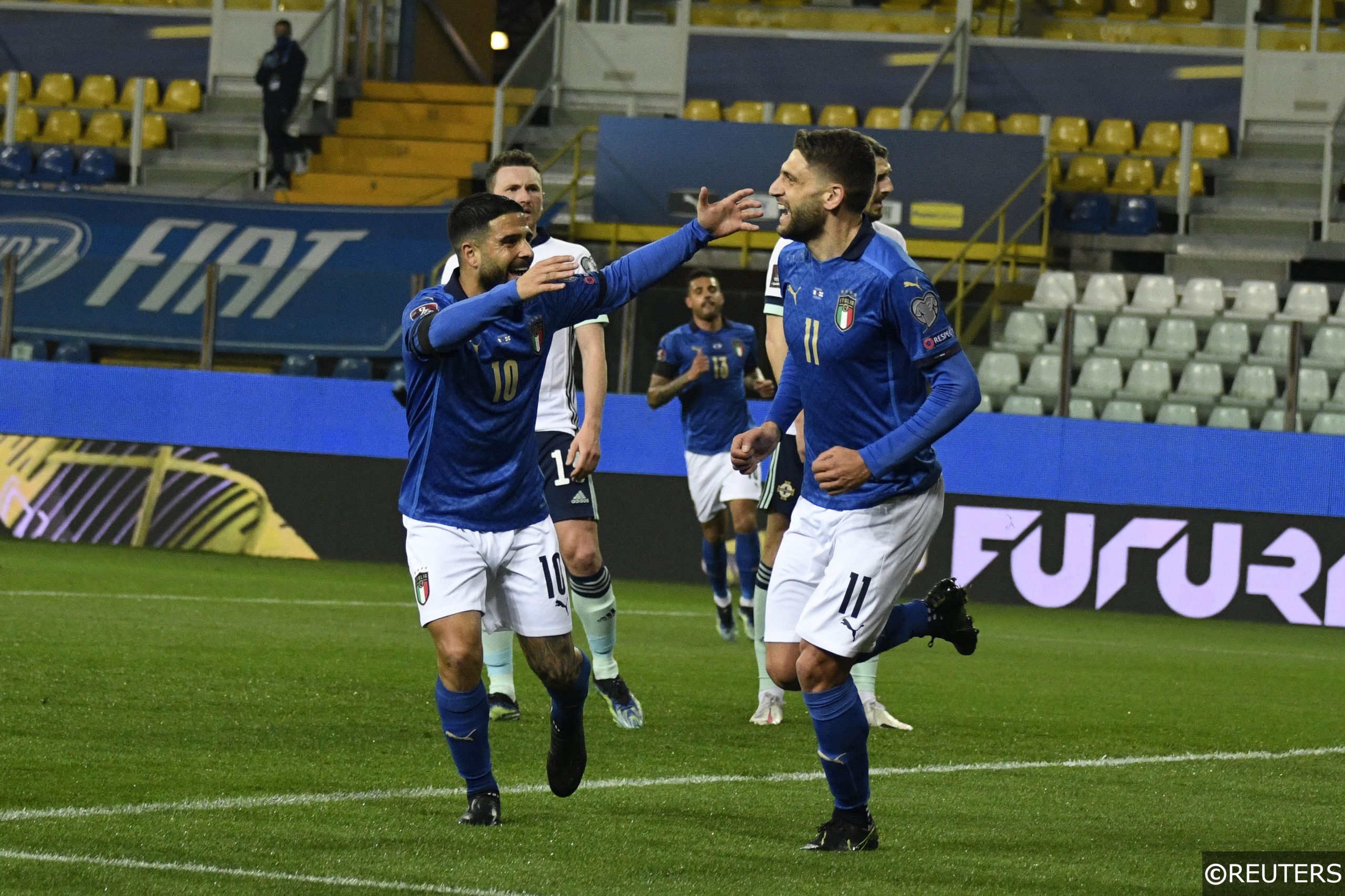 COMPLIANT Insigne and Berardi celebrate a goal for Italy